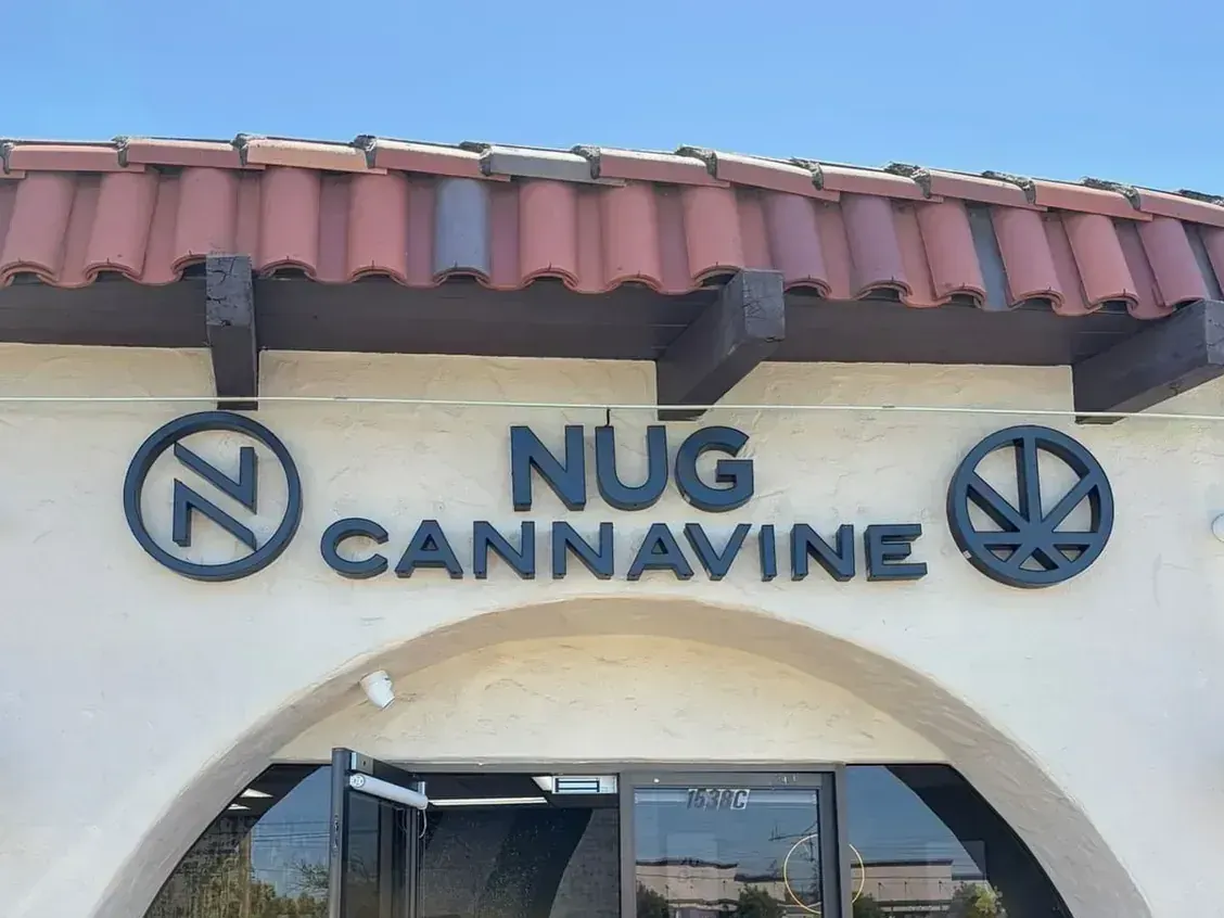 Nug Cannavine building with red tile roof and arched entrance